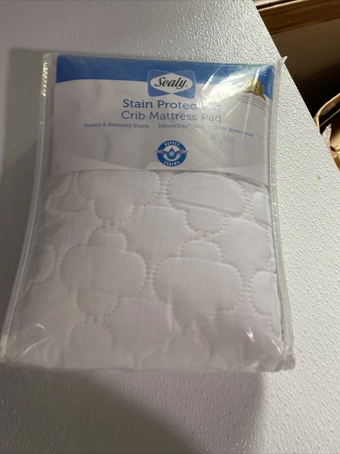 Almohadilla de colchón para cuna ajustada Sealy Stain Repel y Liberación tapa de cama blanca