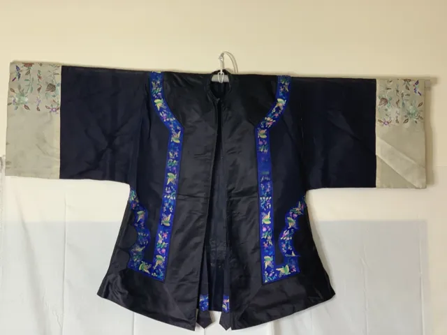 20th century Chinese embroidered on black and cream silk robe