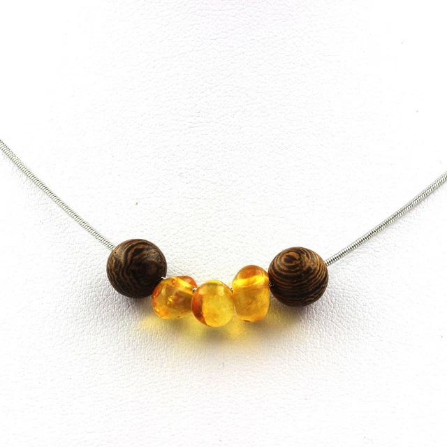 Minéraux et pierres précieuses. Collier 11 perles Ambre véritable de la