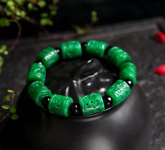 T03 Armband aus grüner Jade geschnitzt Rollen Zylinder Perlen