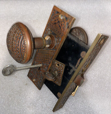 1887 Trenton Vestibule Doorknobs, Backplate, Rosette, & Key Plate Set