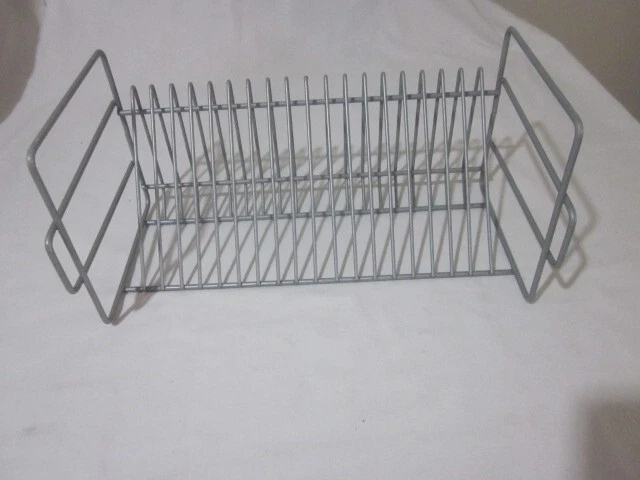 metal cd rack holds about 20 cds can be stalked on each other grey colour used