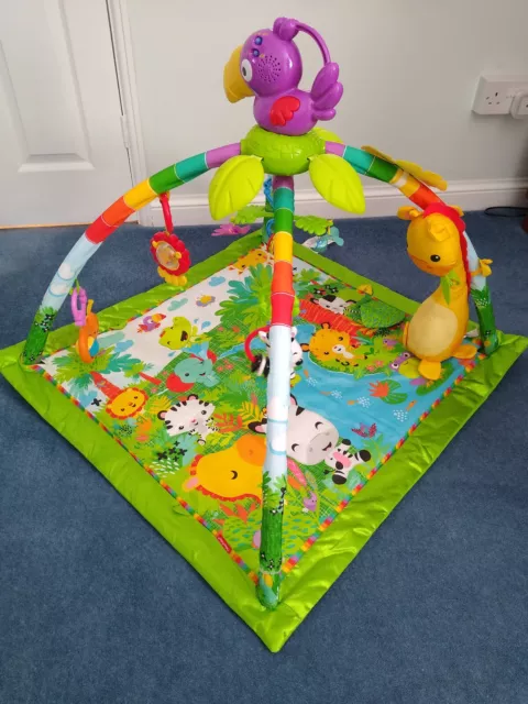 FISHER PRICE RAINFOREST MUSIC and lights deluxe baby gym and