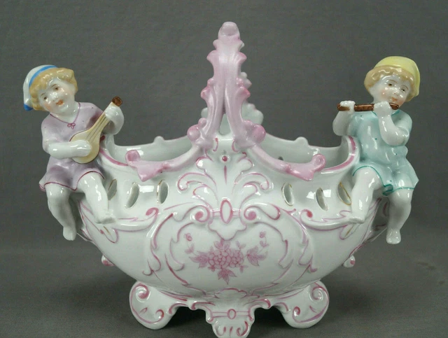 Late 19th Century German Figural Cherub Musicians Pink Rococo Basket Jardiniere