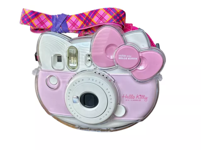 Cámara instantánea FUJIFILM Hello Kitty Fuji Instax serie mini rosa con estuche transparente