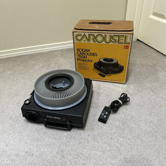 Paquete de proyector deslizante Kodak Carousel 750H caja cargador remoto probado