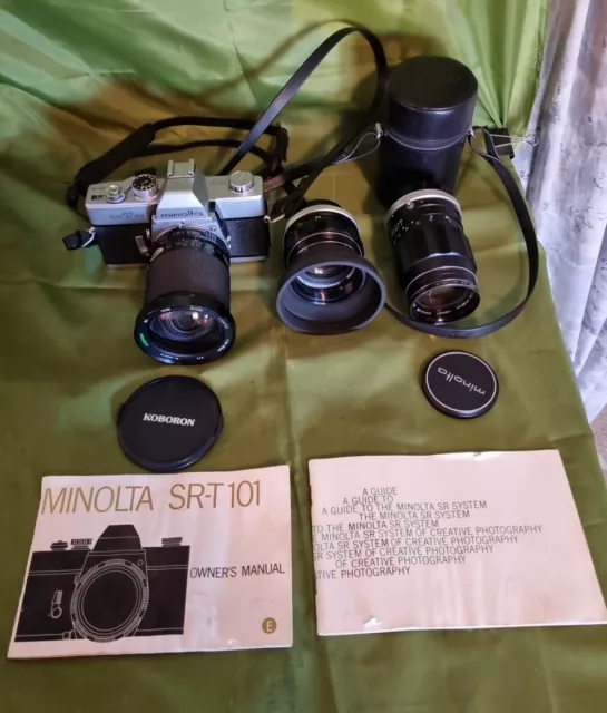 Minolta SRT 101 35mm Film SLR with 3 Lenses And Manuals