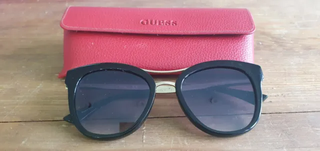 Guess black / gold frame sunglasses. GF 0304. With case.