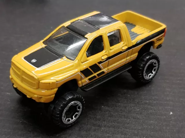 Vintage 2006 Hot Wheels Dodge Ram 1500 Yellow Pickup Truck Diecast 3 1/4" Mattel