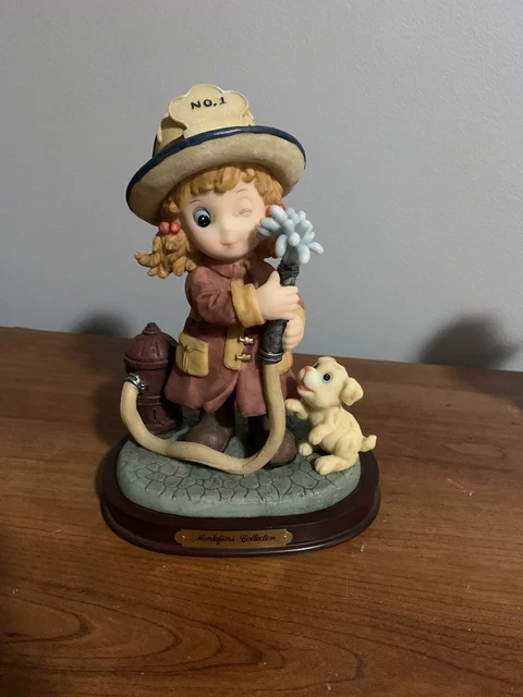 Montefiori Collection Little Girl Firefighter with Puppy Dog