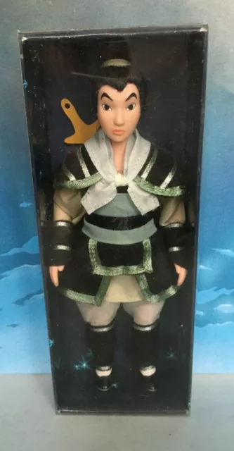 POUPEE DOLL PORCELAINE PRINCESSE DISNEY ED. ATLAS AVEC BOÎTE MULAN SOLDAT+/-17cm