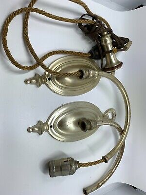 Vintage pair of Colonial Premier cast brass silver luster finish sconces fixture