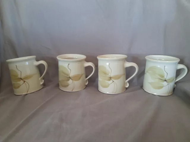 Pottery mugs  signed  as new never used.