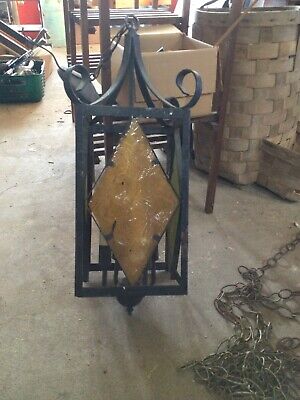 Vintage Hanging wrought iron colored glass lamp 25” Tall With Chain.