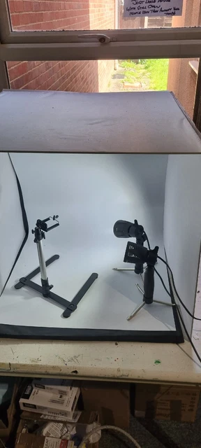 Juego de trípode y fondo con caja de fotos