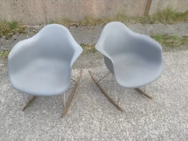 Eames rocking chairs...matched pair in light grey...moulded plastic.late 1960s ?