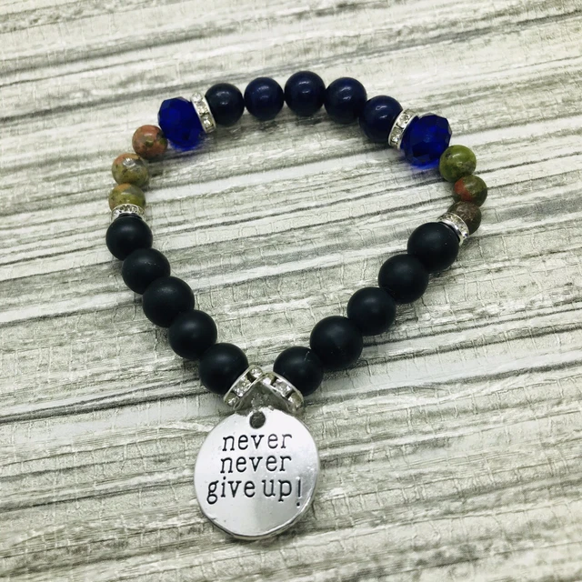 Bracelet de guérison spirituelle chargé perles de lave mélangées chakra charme argent