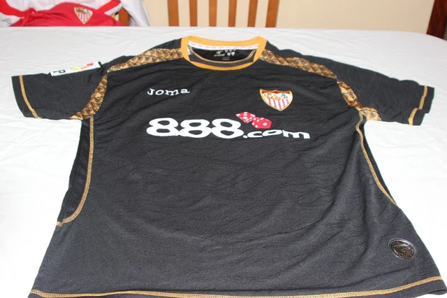 CAMISETA MATCH CHAMPIONS POR AFRICA SEVILLA F.C MARCA JOMA