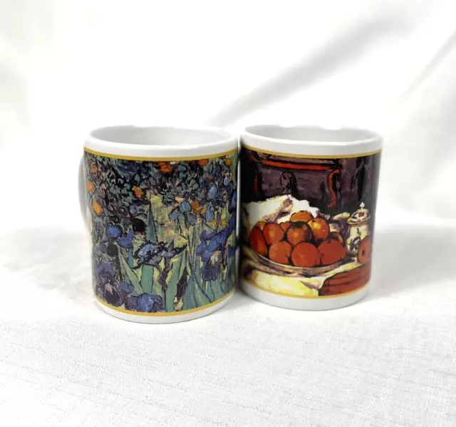 Lot of 2 Cafe Arts Henriksen Imports Cezane Fruit Basket & Van Gogh Irises Mugs Lot of 2 Cafe Arts Henriksen Imports Cezane Fruit Basket & Van Gogh Irises Mugs