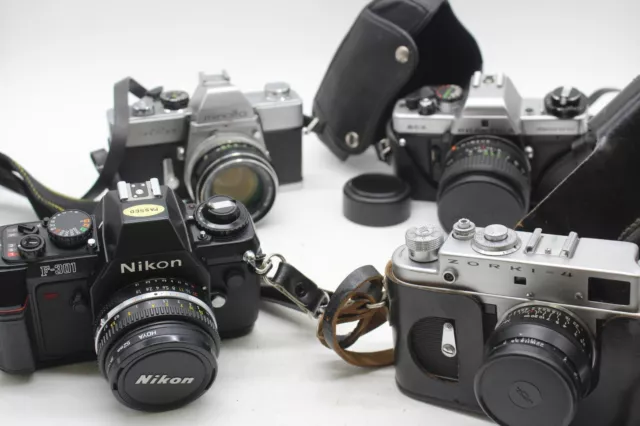 F x4 Vintage SLR Film Cameras Inc. Praktica BCX, Minolta SRT 101, Nikon F-301