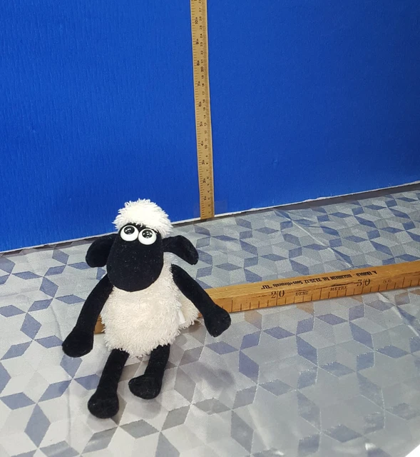 PELUCHE DOUDOU SHAUN le Mouton Musical qui fonctionne"giochi preziosi
