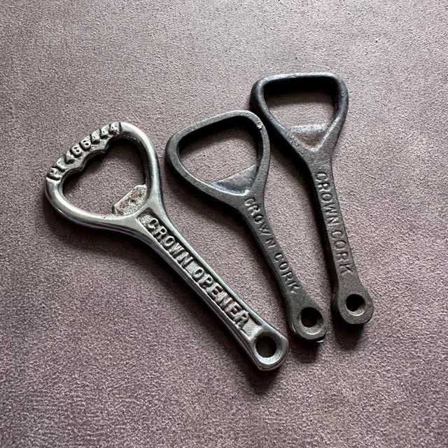 3X VINTAGE COLLECTABLE 'CROWN CORK' CAST IRON BOTTLE CAP OPENERS
