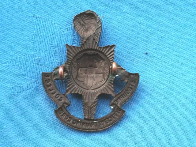 The Eastbourne College Officer Training Corp cap badge. 2