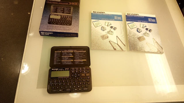 Sharp ZQ-1200 electronic Organiser 34KB with original box, Manual Needs Battery