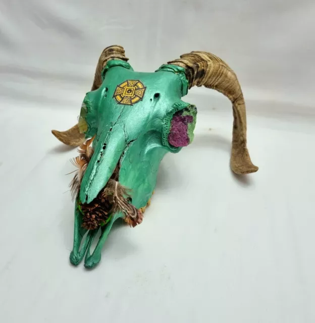 Vintage Pagan ram's skull painted metallic green & decorated with crystal eyes.