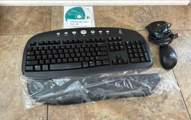 Logitech Cordless Desktop EX 110 Wireless Keyboard New Mouse Used