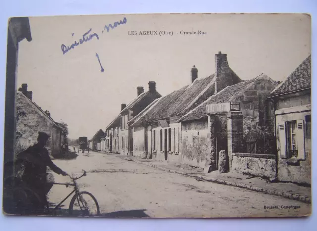 CPA 60 Les Ageux grande rue vélo postier vin tabac Carte postale Oise