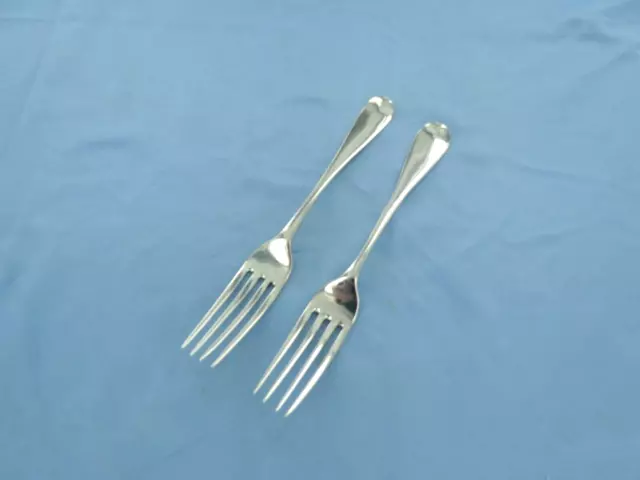 An Antique Pair Of Sterling Silver Old English Dessert Forks. London 1854.