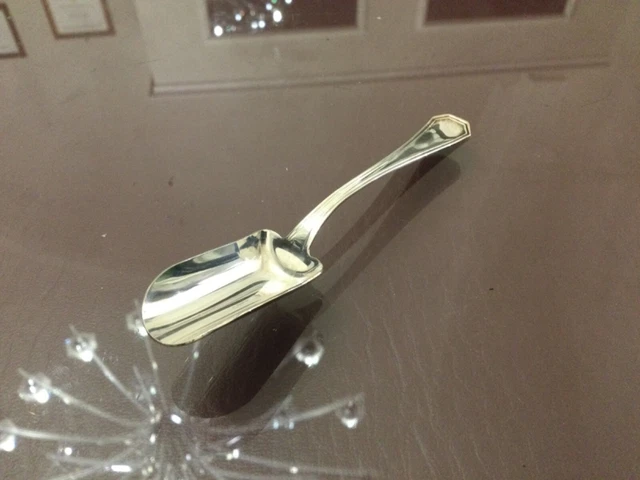 CUCCHIAINO DA ZUCCHERO IN ARGENTO MASSICCIO 800/1000.NUOVO 12 grammi