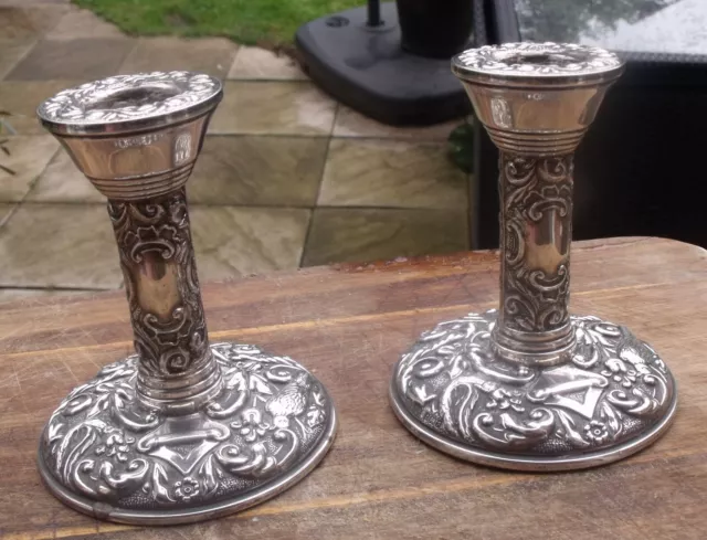 A Pair Of Vintage Sterling Silver Birmingham 1989 Repousse Candlesticks.