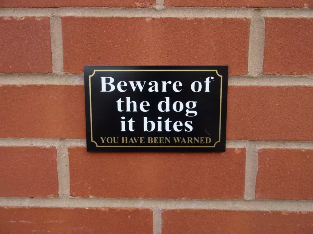 Black beware of the dog it bites you have been warned sign - All Materials