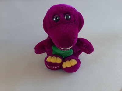 stuffed purple dinosaur