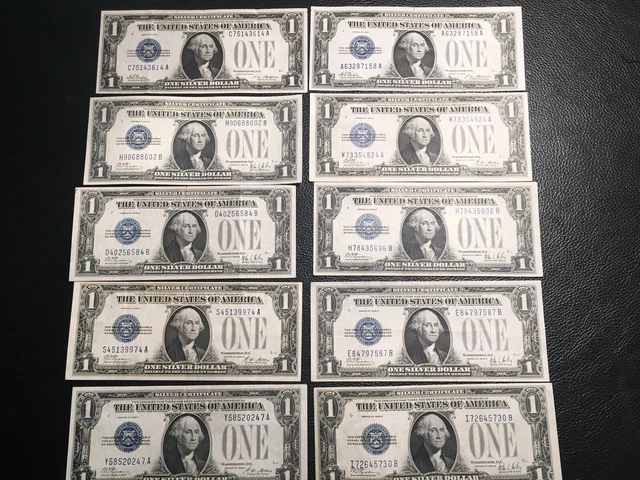 10 1928 series funny back 1.00 silver cert.higher grade white some crispness