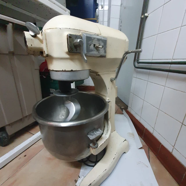 Hobart AE200 20 quart commercial bakery mixer with dough hook and bowl.