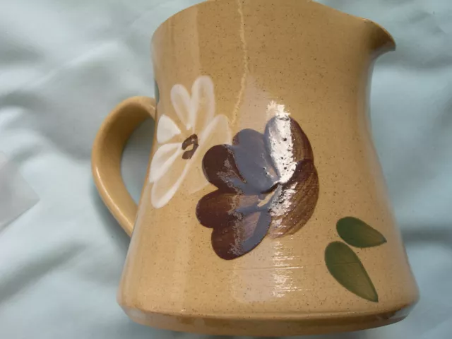 Holkham Pottery milk jug - signed GR or CR on base - selling for charity