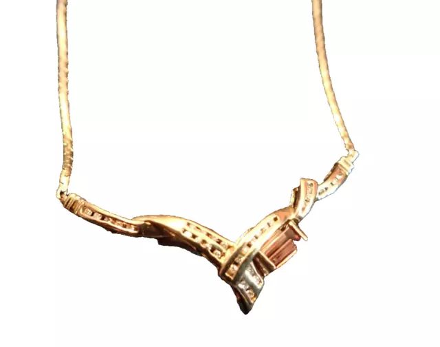 Unique 14 kt pink copper-bearing tourmaline and channel set diamond necklace