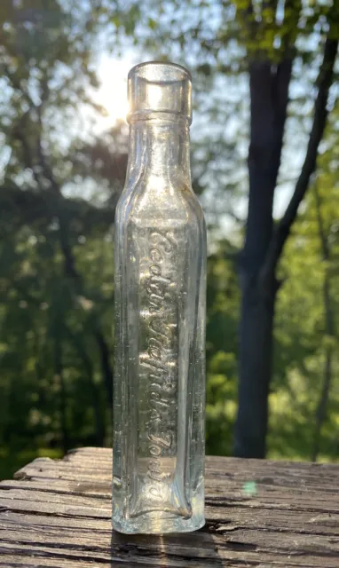 W.F. Severa, Cedar Rapids, Iowa clear bitters bottle 2