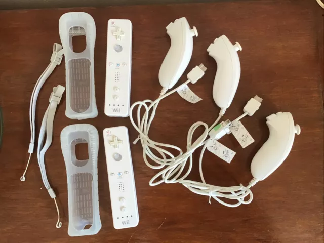 Lot 2 Manettes Nintendo Wii Wiimote Avec 3 Nunchuk Dragonne Et Housse Officiel 2