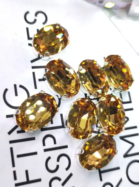 Estrás de vidrio ovalado amarillo topacio de calidad 10x14 mm 8 piezas garra plateada