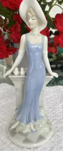 Elegant Porcelain Lady Figurine with Hat, Gloves, Doves, Hat, Blue Dress