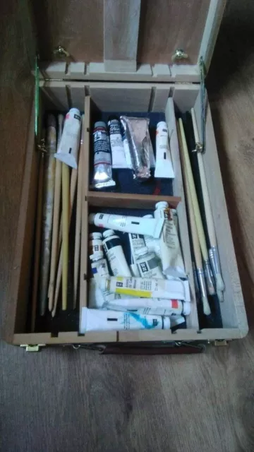 Windsor and Newton Oil Paints and Portable Easel and brushes.