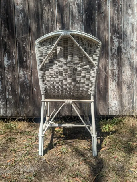 Antique white cane wicker feature chair