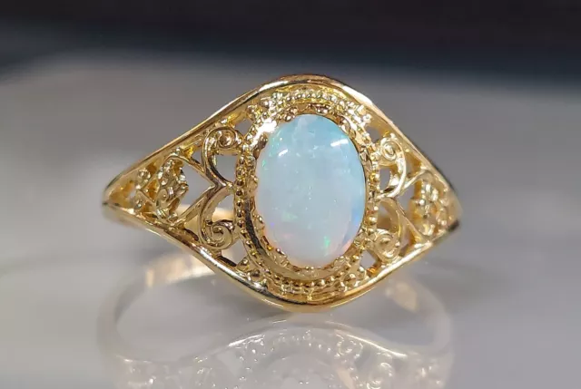 Charming Opal Filigree Ring, 10Kt Gold.