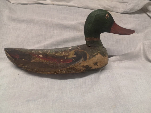 Sold Price: Sujet décoratif en bois sculpté représentant une voiture