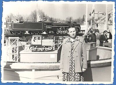 Girl at VDNKh Moscow Model of locomotive and tractor Vintage photo