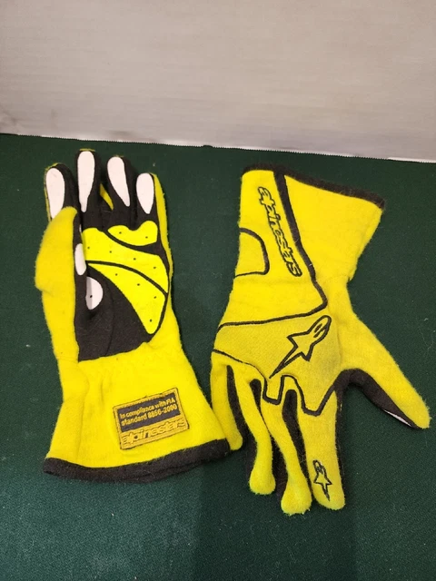 Alpine Stars Glives.  3.3/5 FIA compliance Standard 8856-2000 Used
